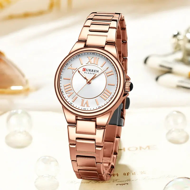 Montre CURREN 9091 Femme avec Bracelet Acier et Affichage Or Rose