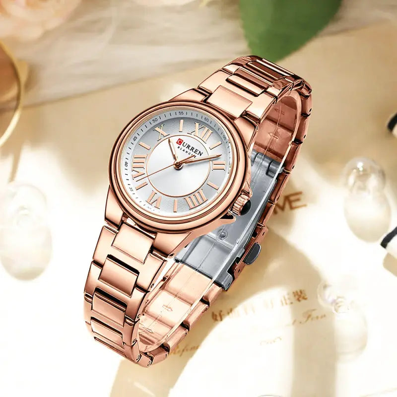 Montre CURREN 9091 Femme avec Bracelet Acier et Affichage Or Rose