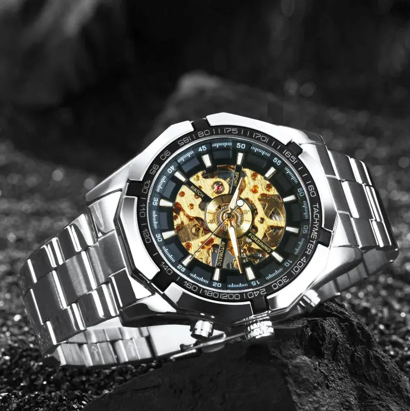 Orologio da uomo WINNER Skeleton con lancette luminose e cinturino in acciaio inox, design meccanico e di lusso.