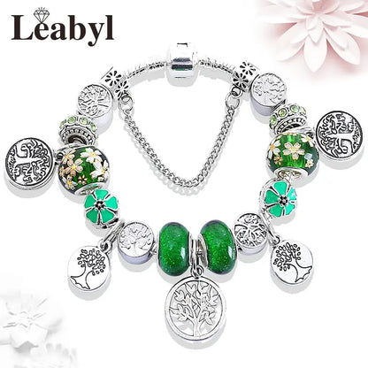 Braccialetto con albero della vita e perline di cristallo verde, elegante accessorio in argento tibetano.