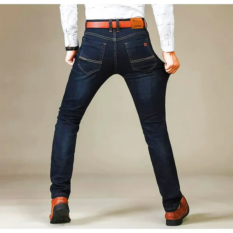 Jeans elasticizzati aderenti da uomo, autunnali, pantaloni casual in denim cotone, perfetti per il lavoro.